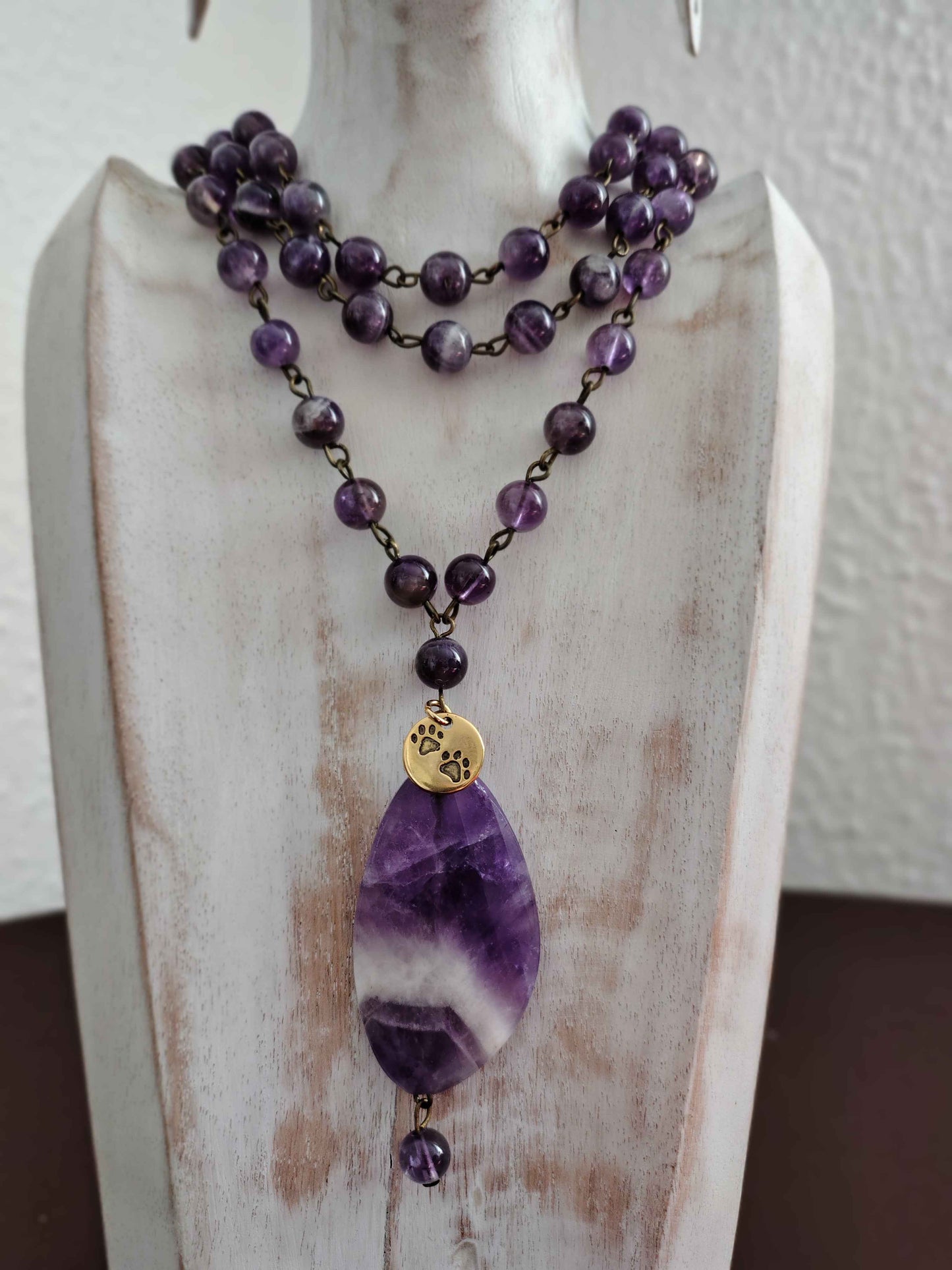 Collana in ametista con vela come pendente